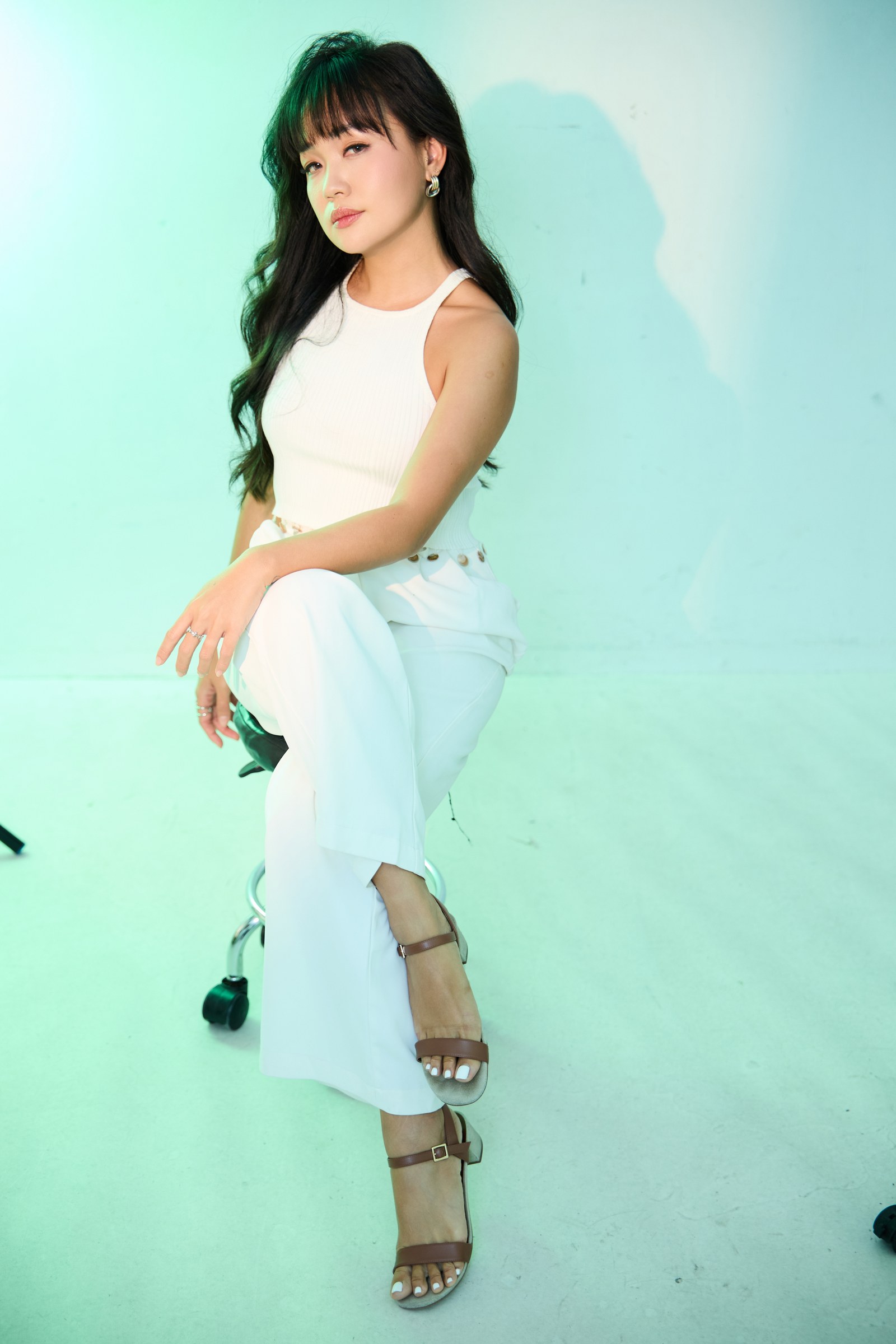 Melodie Yap in a light full-length studio portrait